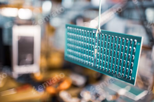 Preview: Microcircuits and components lie on metal plates
