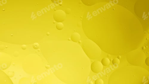 Preview: oil with bubbles on yellow background