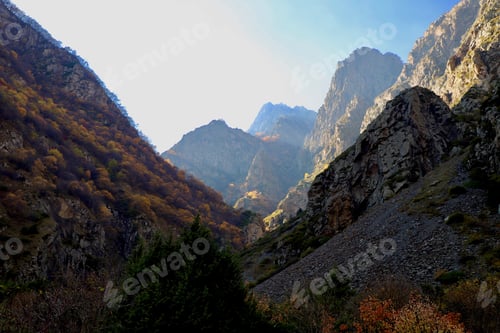 Preview: Majestic Mountain Range with Autumn Colored Foliage