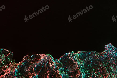 Preview: top view of crumpled foil with colorful lighting reflection in darkness isolated on black with copy