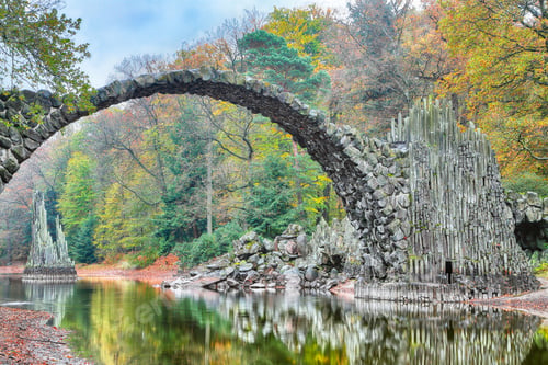 Preview: Fabulous autumn landscape in Azalea and Rhododendron Park Kromlau. Rakotz Bridge