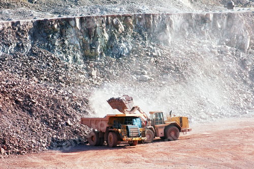 Preview: eath mover loading stones on a dumper truck. mining industries.