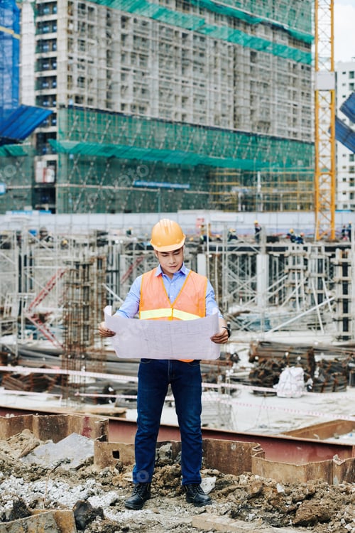 Preview: Engineer at construction site of skyscraper