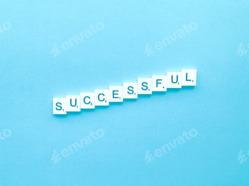 Preview: Successful Word Tiles on a Light Blue Background