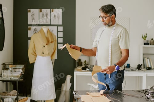 Preview: Indian Tailor Working in Atelier