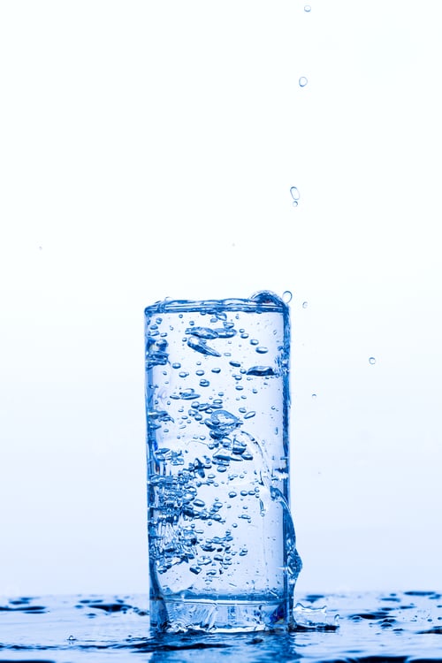 Preview: Glass with pouring drinking water