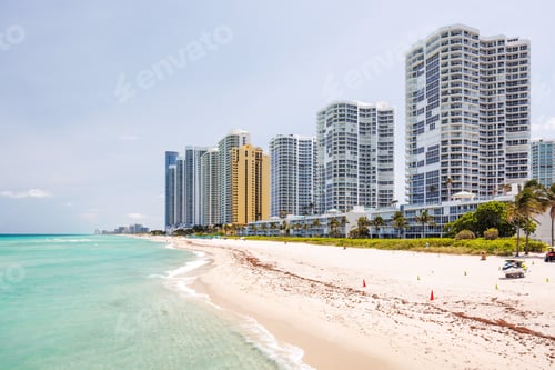 Preview: Modern skyline of Miami with towering skyscrapers, tropical vibe, and waterfront views