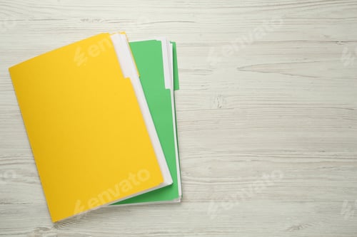 Preview: Yellow and light green files with documents on white wooden table, top view. Space for text