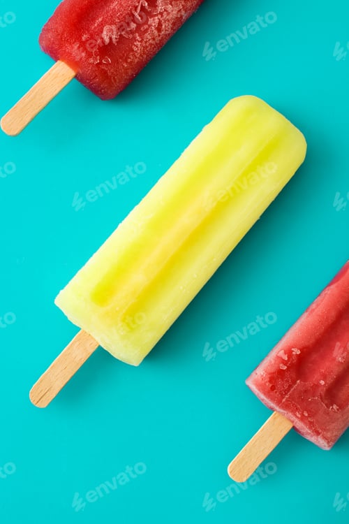 Preview: Colorful ice cream popsicles melting on turquoise background