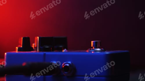 Preview: Extremely close up of button for effect electro guitar pedal