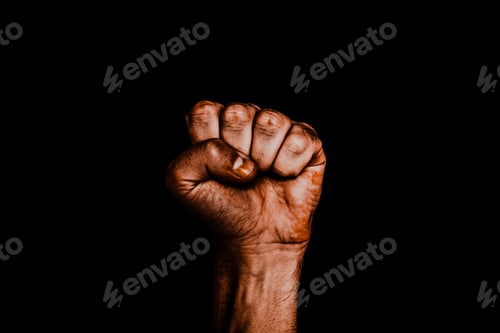 Preview: Male hand clenched into a fist. The black life of matter.