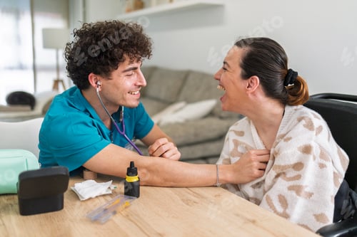 Preview: Healthcare professional providing home care, smiling with cheerful woman