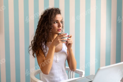 Preview: Woman Relaxing at Home with Hot Drink