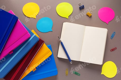 Preview: Open notepad and school stationary supplies at paper table background. Back to school flat lay
