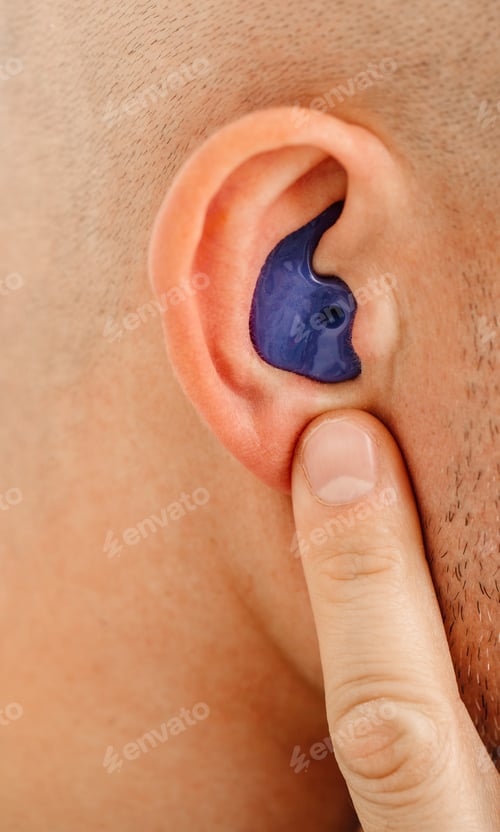 Preview: Personally molded earplugs for use in airplane at high atmospheric pressure with pressure valve.