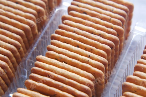 Preview: close up of sweet cookies on wooden table