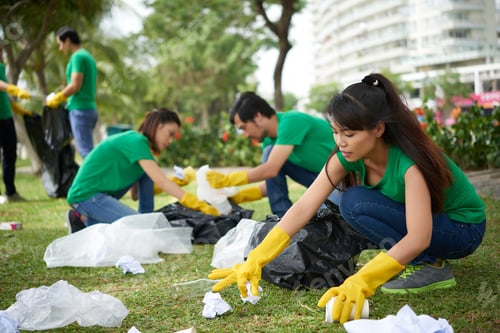 Preview: Collecting trash from park lawn