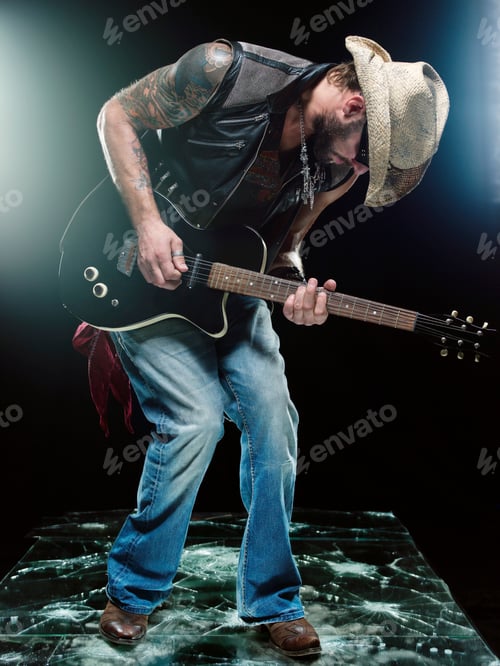 Preview: guitarist playing guitar, close-up view