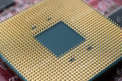 Preview: macro shot of the golden contacts of central processor on the computer motherboard, modern micro and