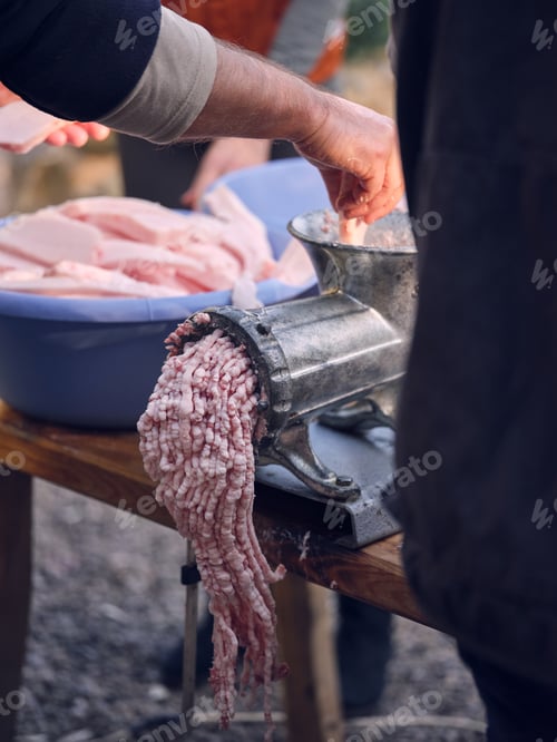 Preview: Crop person near mincing machine