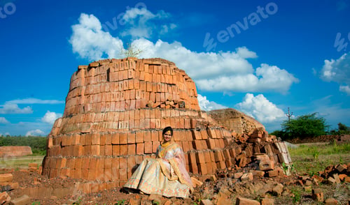 Preview: Beautiful Indian bride on bricks background