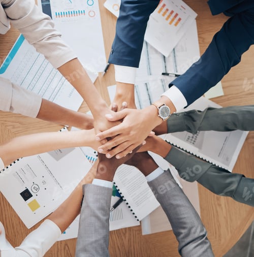 Preview: Team hands, collaboration and meeting of business people in agreement together above papers at work