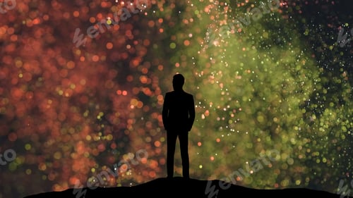Preview: The human silhouette standing on a small shiny particles background.