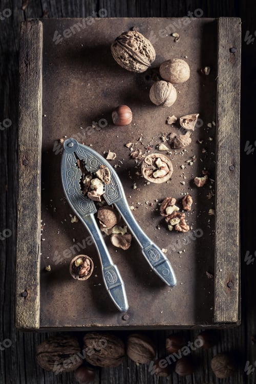 Preview: Healthy walnuts and hazelnuts with on rustic table