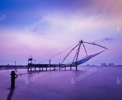 Preview: Chinese fishnets on sunset. Kochi, Kerala, India