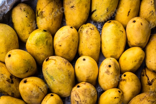 Preview: Full frame of fresh yellow mangos