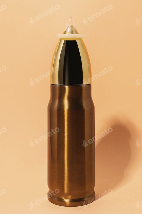 Preview: Make love, not war. Pacifism and non-violence movement. Bullet with a condom on the top.