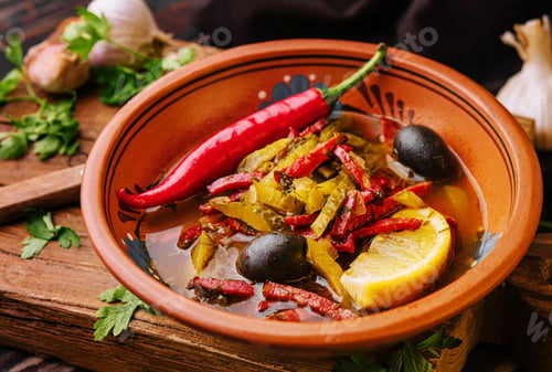 Preview: Meat Solyanka soup on a wooden board
