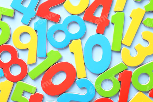 Preview: Colorful numbers on light blue background, flat lay