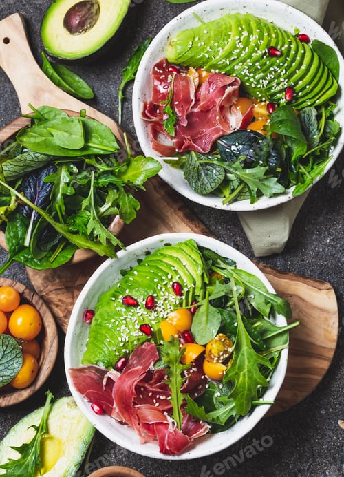 Preview: Low carbs bowl. Fresh salad with green spinach, rucola, avocado