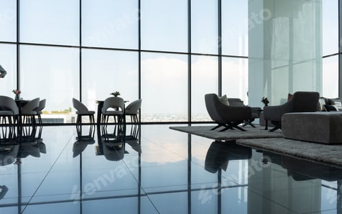 Preview: Interior of light living room with brown, grey sofas, coffee table and large window