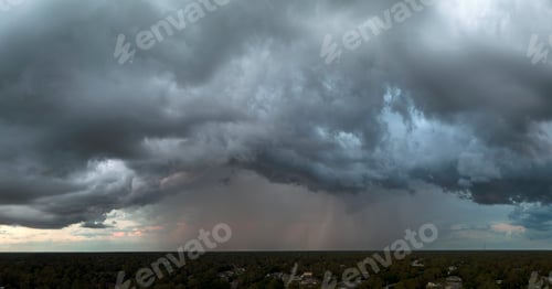 Preview: Landscape of dark ominous clouds forming on stormy sky