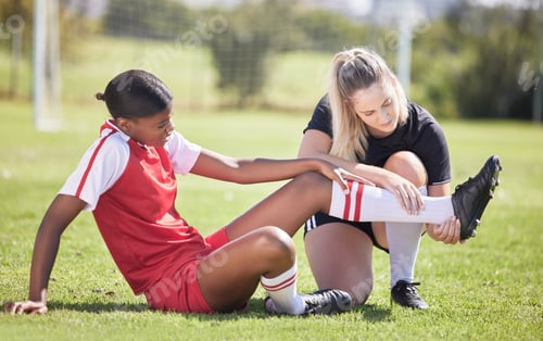 Preview: Soccer, sports and injury of a female player suffering with sore leg, foot or ankle on the field. P