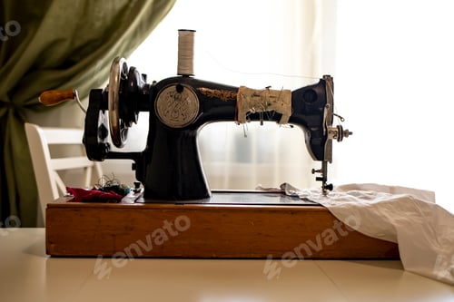 Preview: Vintage sewing machine on the table.