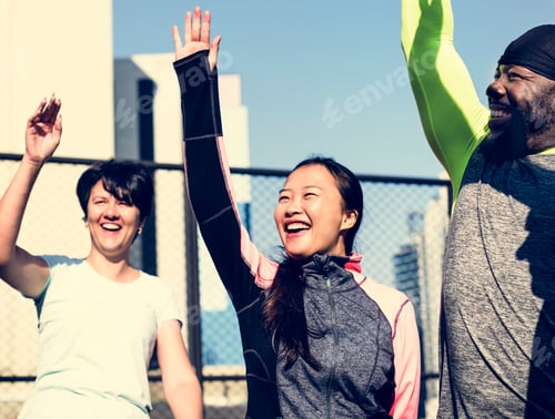 Preview: People exercising at fitness gym