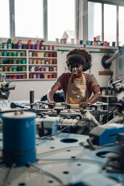 Preview: Interracial graphic technician operating manual printing machine.