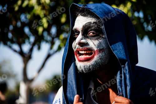 Preview: Close-up portrait of a horrible scary zombie man. Horror. Halloween.