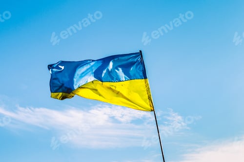 Preview: Ukrainian flag against blue sky