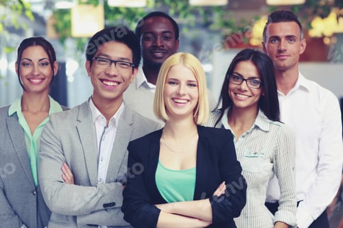 Preview: Happy Group Of Co-Workers Standing In Office
