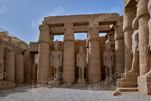 Preview: some big statues of different shapes in a building with stairs