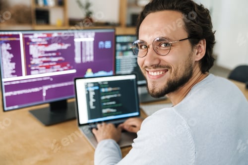 Preview: Image of programmer man wearing eyeglasses working with computers
