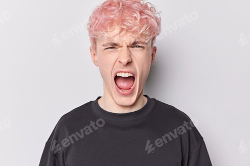 Preview: Human reactions and negative emotions concept. Emotional pink haired European man shouts loudly