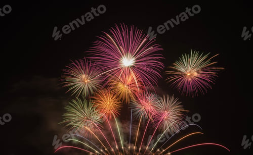 Preview: Fireworks festival display at night. Variety of fireworks in celebration. Happy New Year.