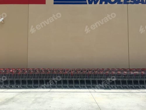 Preview: Line of shopping carts outside of grocery store room for copy