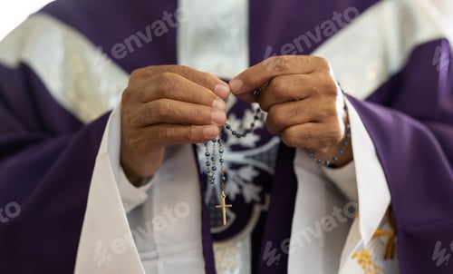 Preview: Priest, pastor and man hands with rosary with cross in church, prayer and catholic worship, praying