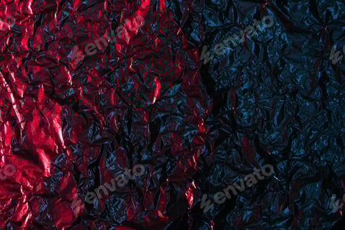 Preview: glittering abstract crumpled red and black foil background